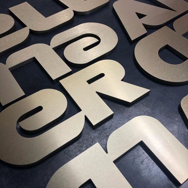 COLDWELL_BANKER_BRUSHED_GOLD